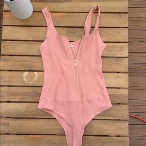 nude pink zip bodysuit